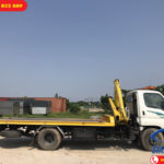 Xe tải cứu hộ gắn cẩu sàn trượt càng kéo Hyundai 110SP