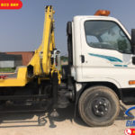 Xe tải cứu hộ gắn cẩu sàn trượt càng kéo Hyundai 110SP